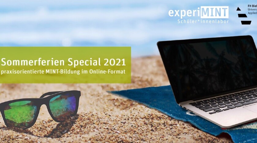 Sonnerbrille neben Laptoap am Strand